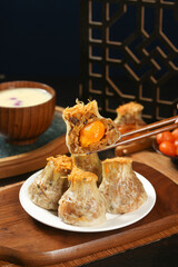 Traditional Chinese Siu Mai Dumplings with Salted Egg Yolk and Glutinous Rice Filling