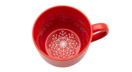 Overhead view of a red mug with snowflake design and a matching coaster isolated on transparent background