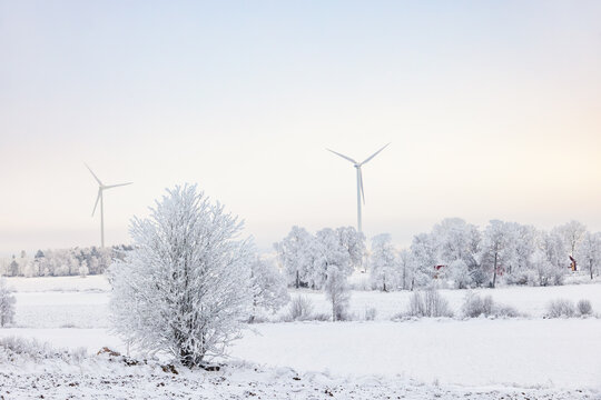 Wind turbines a cold frost winter day in the countryside