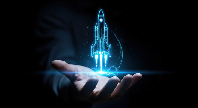 Futuristic rocket launch hologram blue glowing spaceship digital technology innovation startup concept human hand dark background creative energy imagination progress