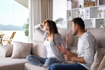 Couple arguing and woman refusing him