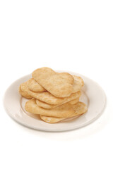 Crispy Rice Crackers on White Plate - Asian Snack Food Photography
