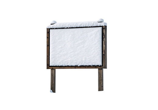 Wooden notice board with white blank surface covered in snow on posts with winter frost, isolated on a transparent background