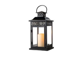 Black metal hanging lantern, decorative openwork design with flameless candle and arched handle, isolated on a transparent background