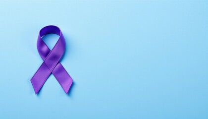A powerful image featuring a purple violet ribbon bow symbol on a wallpaper background to raise awareness for cancer
