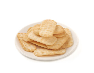 Japanese Senbei Rice Crackers on White Plate - Traditional Asian Crispy Snacks