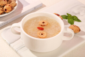 Xinjiang Jujube Porridge Bowl - Traditional Chinese Red Date Soup with Mint Garnish and Cookies