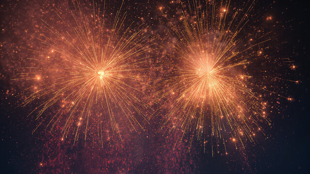Vibrant golden and red fireworks exploding against a dark sky, creating a dazzling and festive abstract background.