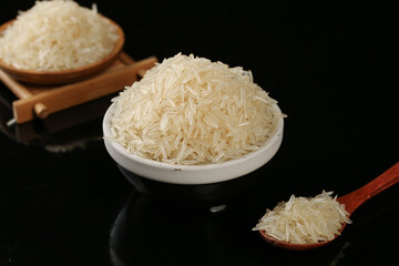 Long Grain White Rice Varieties in Bowls and Wooden Spoon - Premium Milled Agricultural Food Products