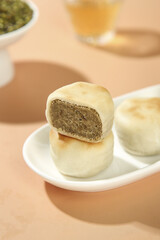 Traditional Mung Bean Cake Dessert with Green Bean Filling and Tea