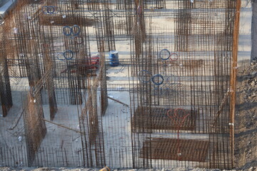 Concrete foundation with vertical steel rebars