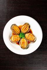 Steamed Golden Abalone Dish with Cross-Hatch Pattern Asian Seafood Delicacy Gourmet Cuisine
