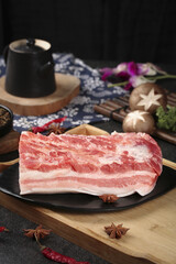 Raw Pork Belly with Chinese Cooking Ingredients and Traditional Spices Food Preparation Showcase