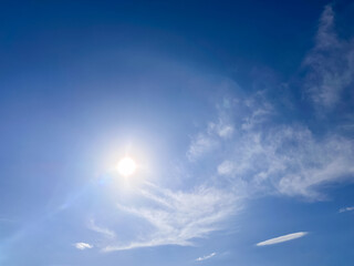 Sunlit Cumulus Cloud with Highlights in Blue Sky