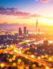 Blurred city skyline glows under a vibrant, orange sunset