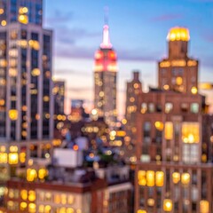 Out-of-focus city skyline at dusk, glowing buildings