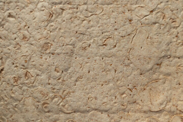 The texture of thin traditional freshly baked homemade oriental bread. Armenian lavash in close-up .