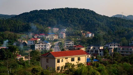 Peaceful Chinese Countryside with Green Forest Hills