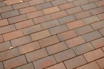 Brick pavement pattern in warm tones