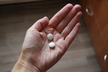 Two pills in your hand