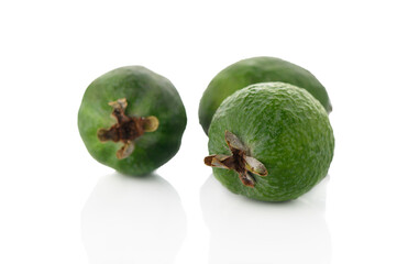 Whole Feijoa with Skin and Stems on Minimalist White Background