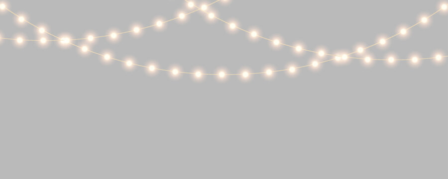 Christmas lights with glowing bulbs. Bright garland decoration for holiday. Gold Christmas and New Year bright garlands, led light strips