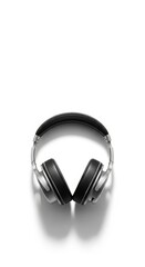 Fototapeta premium Modern black over-ear headphones with metallic accents on white background