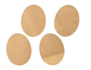 Four tan circles offset, against black backdrop
