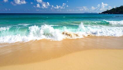 Waves crash on a bright beach with clear turquoise water, under a blue sky with fluffy white clouds