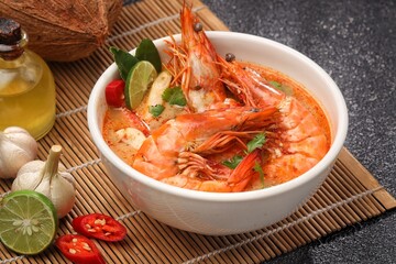 Tom yum goong or tom yam is a family of hot and sour Thai soups