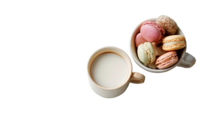 Two mugs, one with milk, the other with colorful macarons