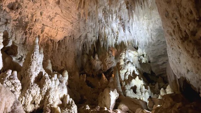 Stalagmites and stalactites create a dramatic underground scene in Waitomo Caves, New Zealand&rsquo;s North Island. Stunning rock formations and natural patterns make this cave unique.