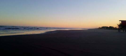 photograph of the sunset on the beach
