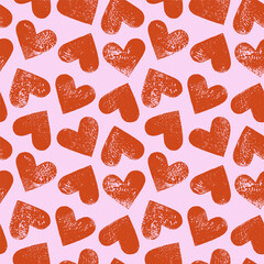Linocut hearts seamless repeat vector pattern. Hand printed grunge relief printing textured aged distressed heart shapes endless Valentine's day background. Craft handmade wrapping paper template