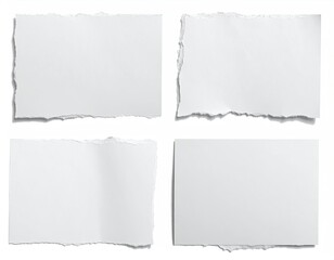 Obraz premium Four torn white paper pieces isolated on a white background