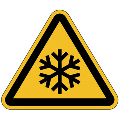 Low temperature warning sign with snowflake symbol on yellow