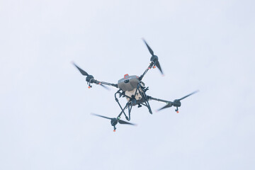 Agricultural Drone Flying in Sky for Smart Farming and Crop Spraying