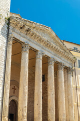 Temple of Minerva columns and pediment in Assisi, Italy