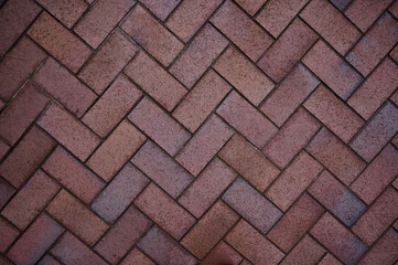 Pavement with interlocking textured bricks. Top view.