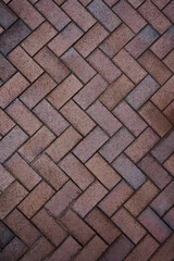 Pavement with interlocking textured bricks. Top view.