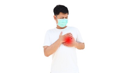 An asian man wearing a face mask holding his chest in pain, symbolizing chest pain or heart disease. Concept of medical care, prevention, and respiratory illness.