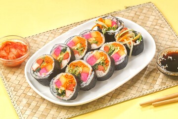 Kimbap or gimbap is a typical Korean rice roll