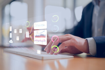 Businessman typing on computer keyboard with ai diagram in concept of ai technology AI agent analyzing data and generating reports. Artificial intelligence and intelligent automation IA technology