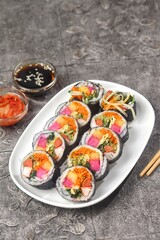 Kimbap or gimbap is a typical Korean rice roll
