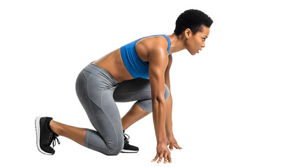 Obraz premium Athletic woman in starting position ready to sprint isolated on black background, perfect for fitness or sports themes