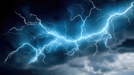 Bright blue lightning bolts illuminate dark storm clouds, creating dramatic and powerful night sky scene