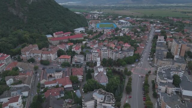 Aerial capturing the Episcopal Cathedral of St. Nicholas in Deva, showcasing its architecture and surrounding urban landscape.