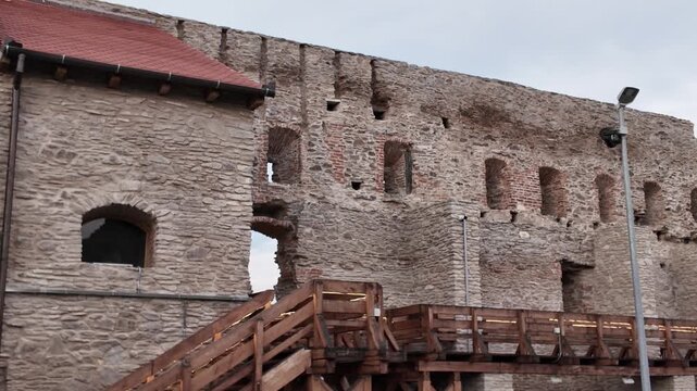 Weathered fortress walls from the historic Fortress of Deva, showcasing the rugged beauty and heritage of this ancient Transylvanian landmark.