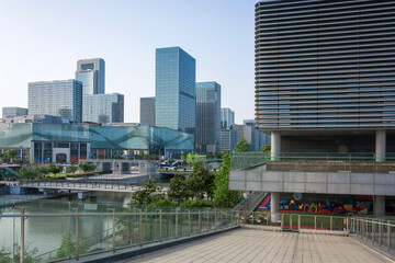 Fototapeta premium Captivating Urban Landscape: Modern Architecture Meets Serene Water Views