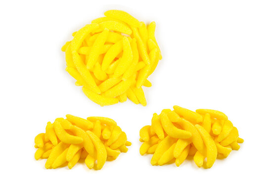 Juicy colorful jelly banana sweets isolated on white. Gummy candies.